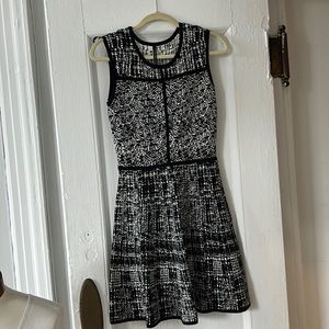 Well fitting beautiful Andrew Marc dress. Brand new never worn